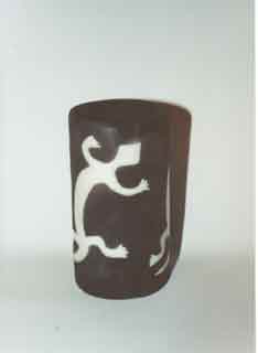 Raku cylinder with transparent glaze and gecko motif