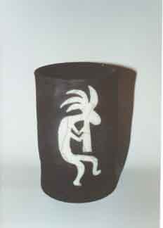 Raku cylinder with transparent glaze with kokopelli motif-view 3