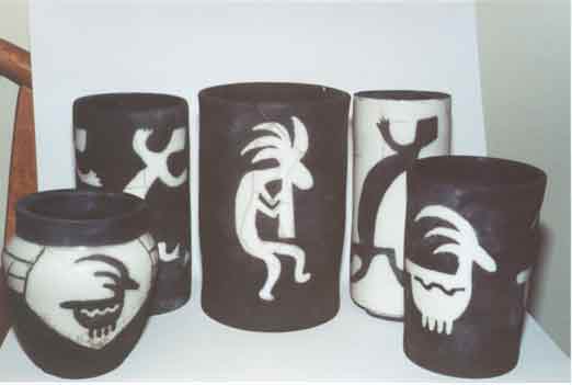 Collection of Raku work done with the Kokopelli, gecko, and ram motifs